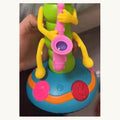 WiggleBug dancing caterpillar toy in green with saxophone