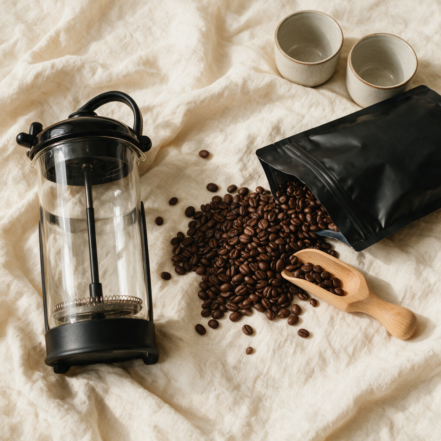 The Press styled flat lay with coffee beans and cups