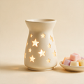 The Melt electric wax warmer in cream ceramic with wax melts