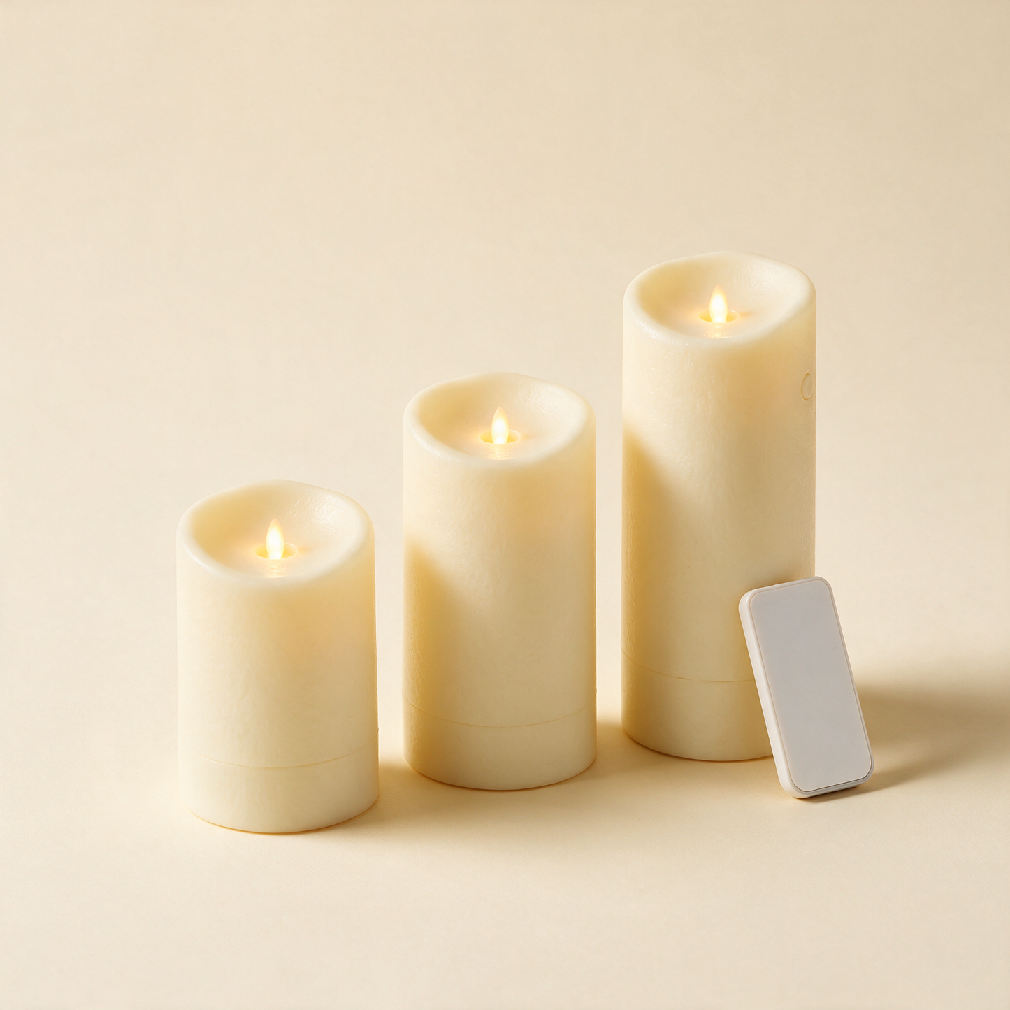 FlickerFlame candle trio with remote at a three quarter angle