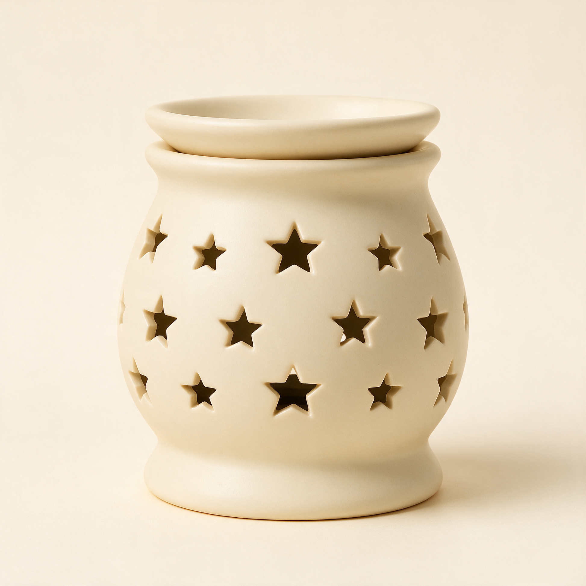 The Melt ceramic wax warmer at an angle showing the melt dish