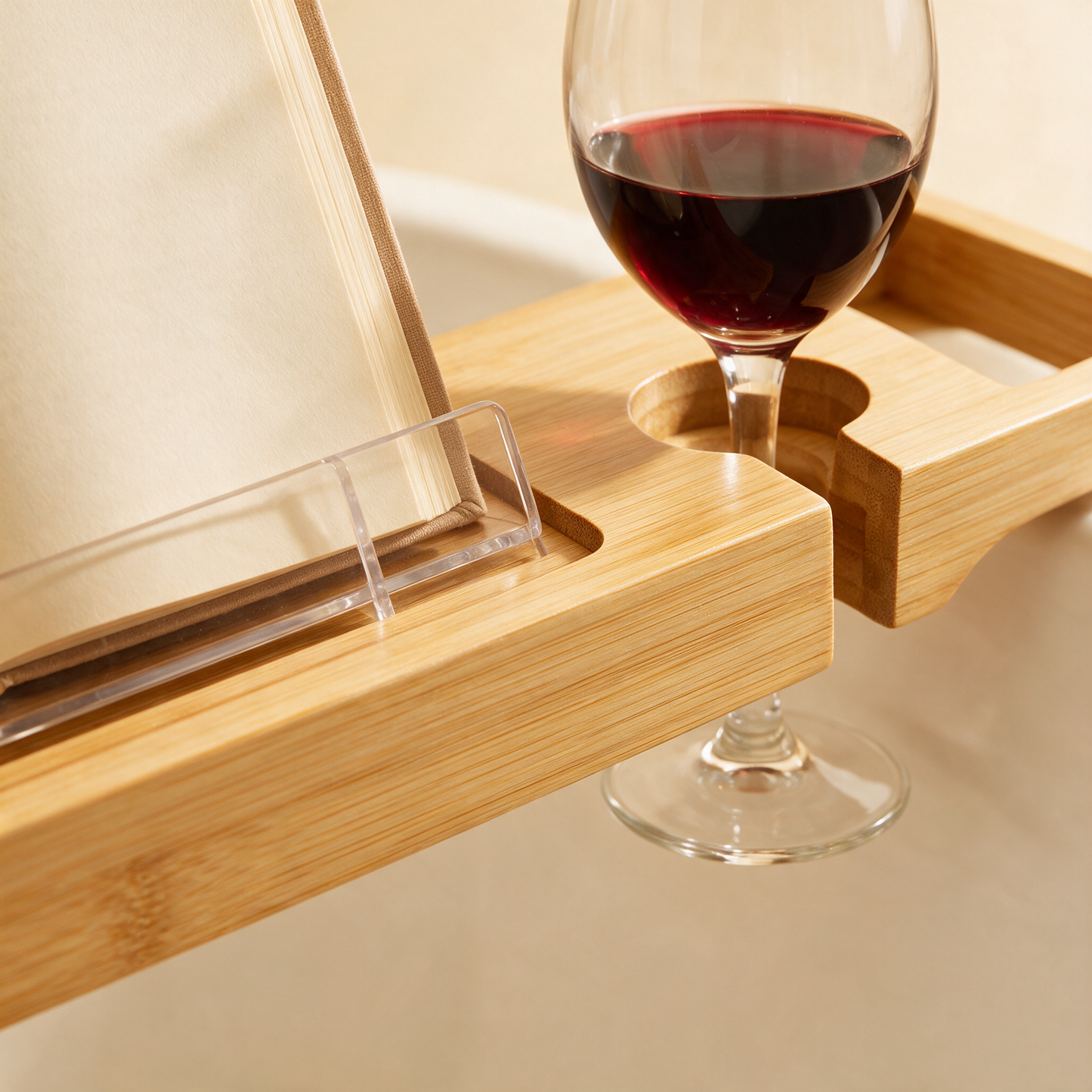 Close-up of The Soak bath caddy wine glass slot and book stand