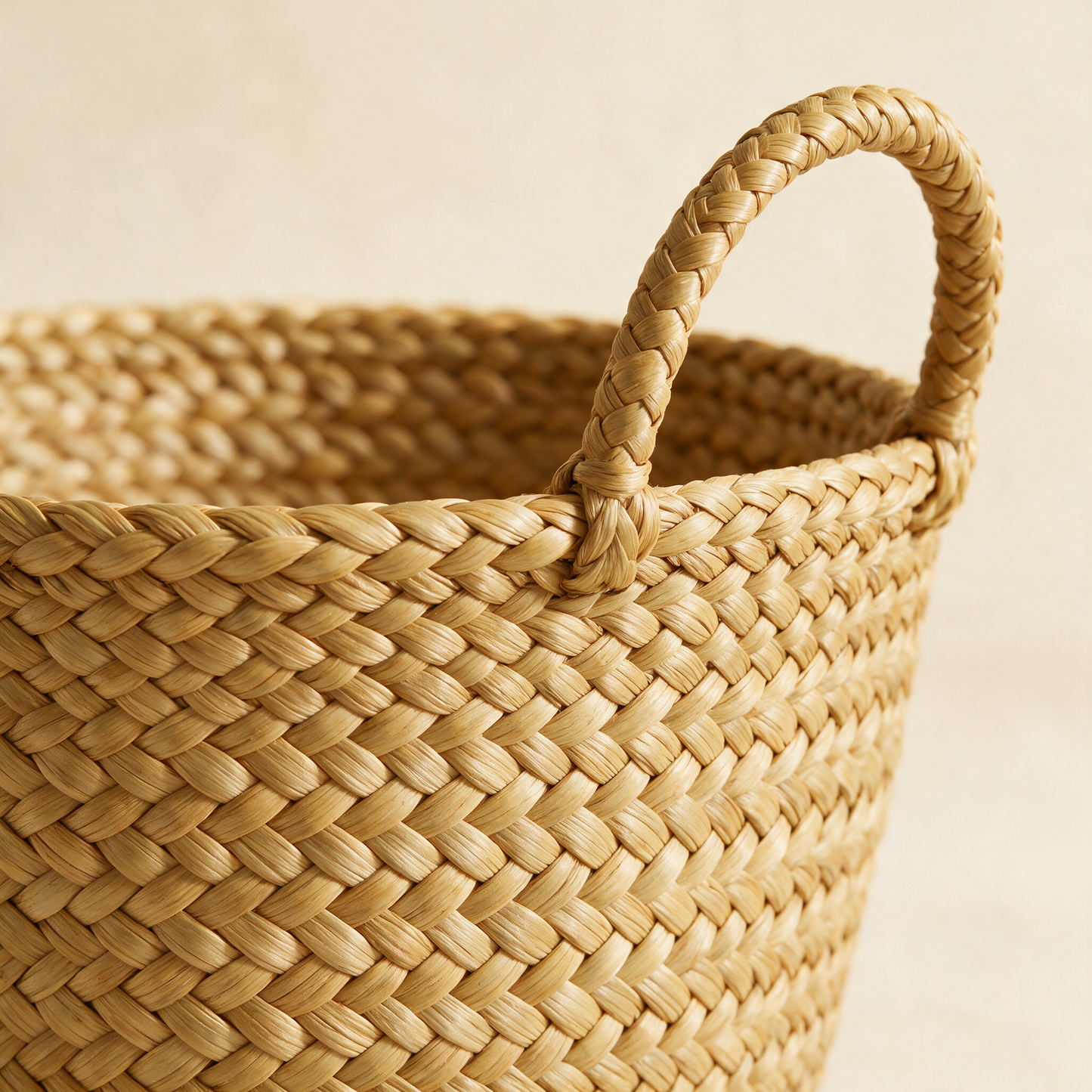 Close-up of The Weave seagrass basket weave and handle