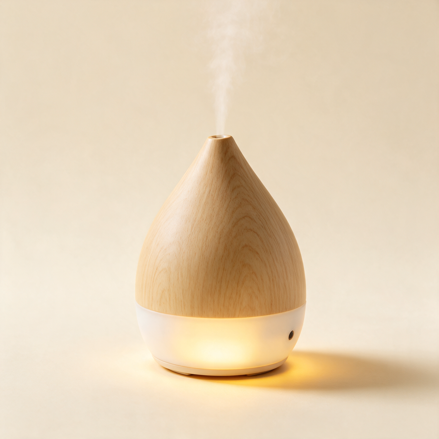 AromaCloud wood grain diffuser with frosted base at an angle