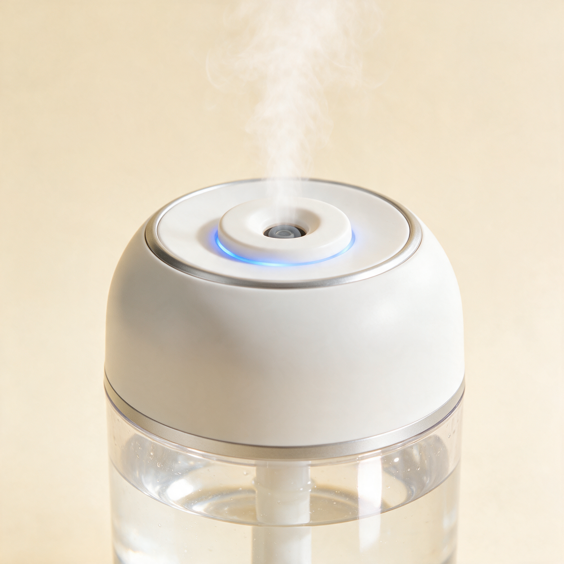 Close-up of the PureMist white top and clear water tank
