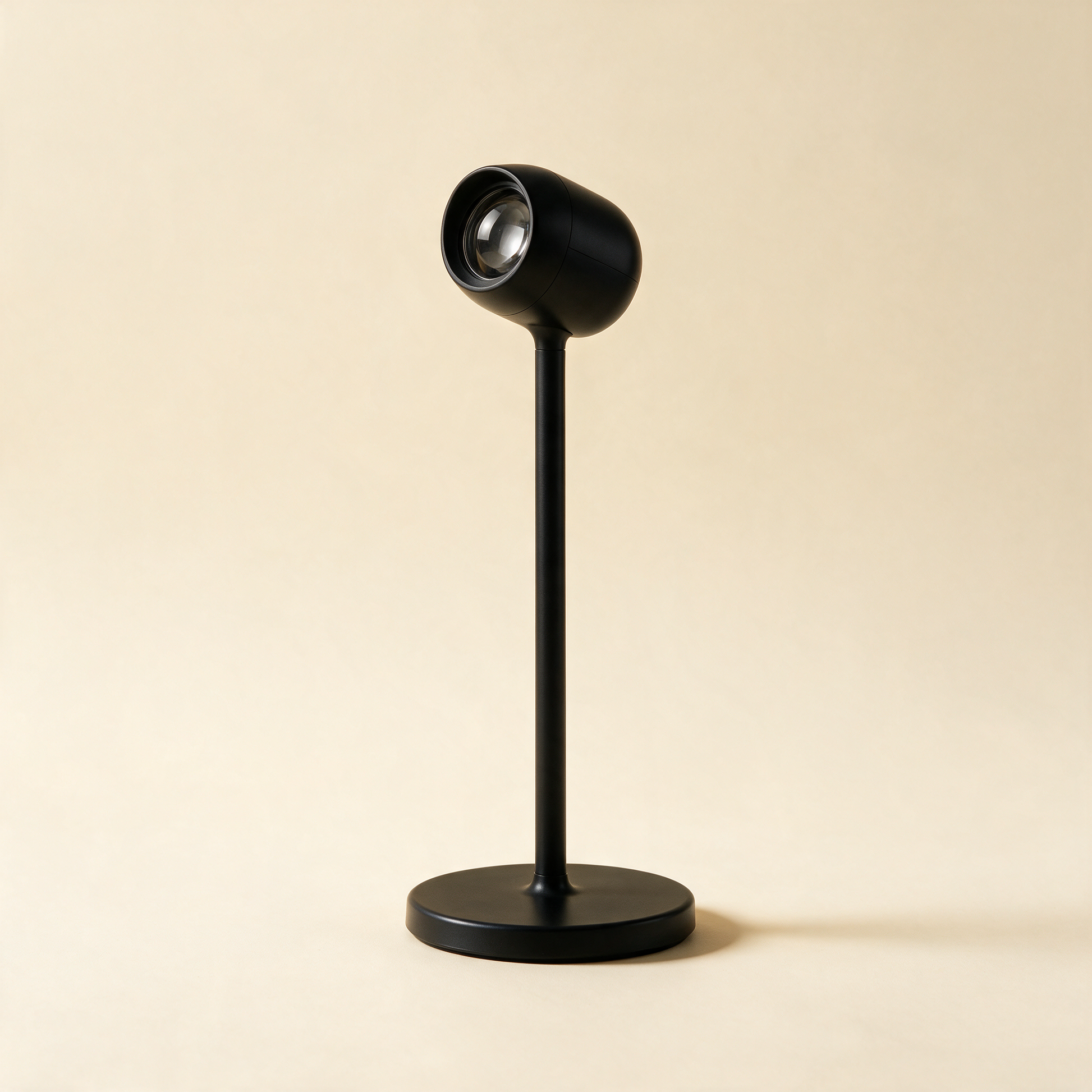 SunsetGlow lamp with slim black stem and round projector head at an angle