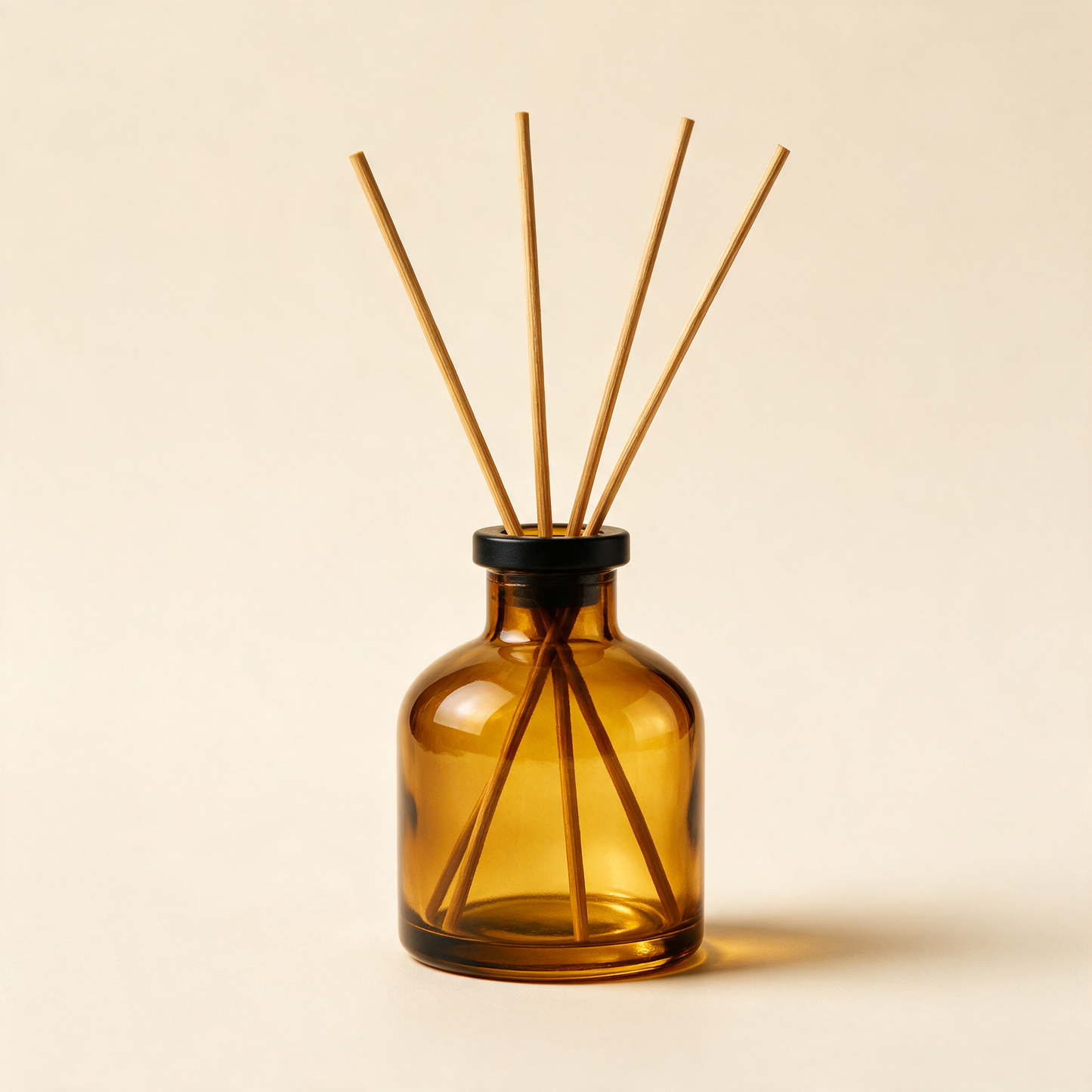 The Haven reed diffuser at an angle with natural reeds fanned out