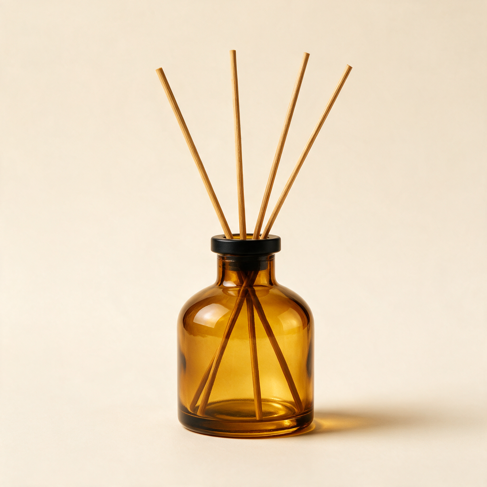 The Haven reed diffuser at an angle with natural reeds fanned out