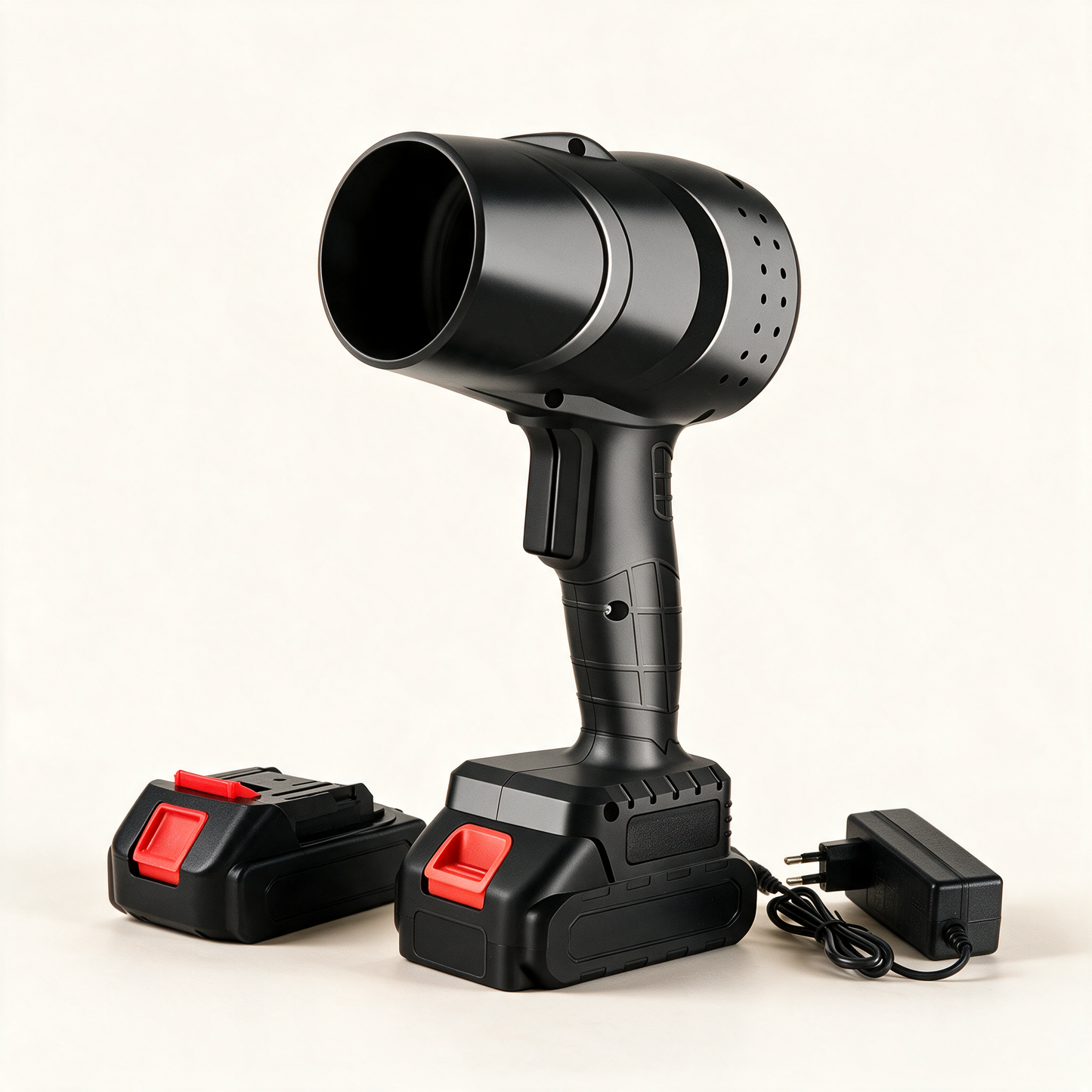 LeafEase blower at an angle with spare battery and charger