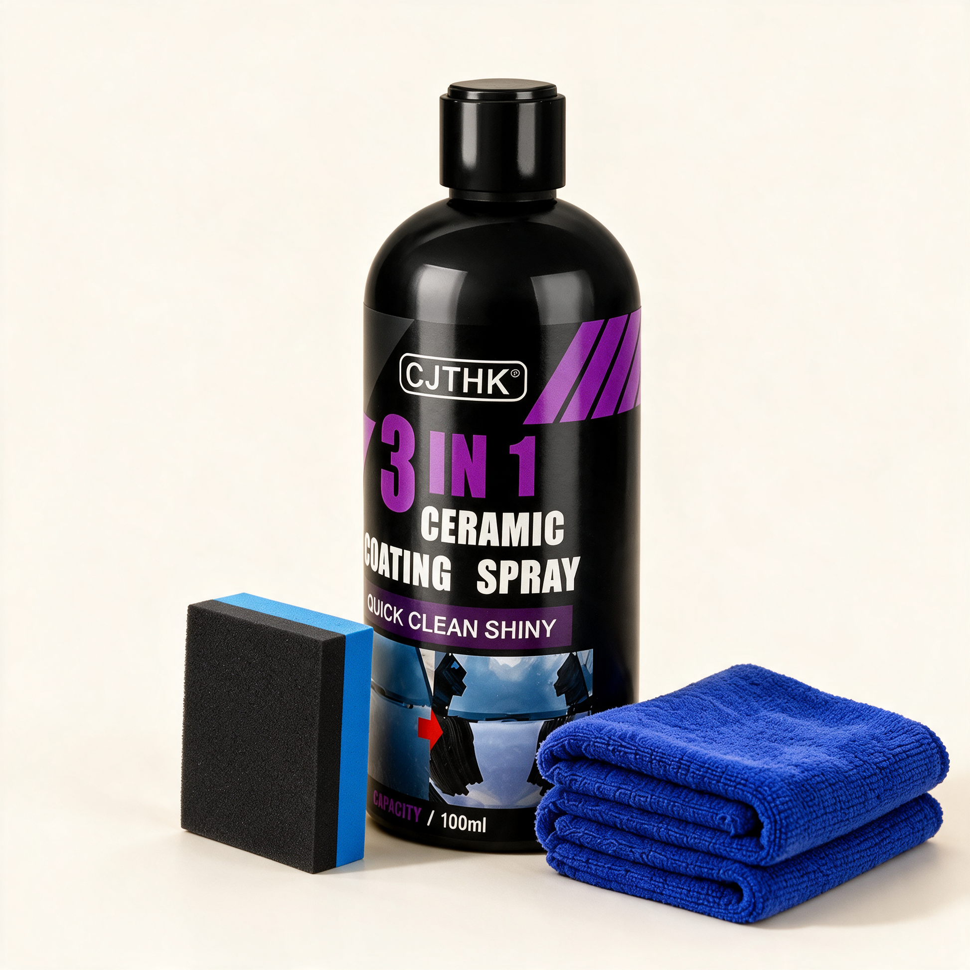 GlossGuard spray bottle at an angle with cloth and sponge