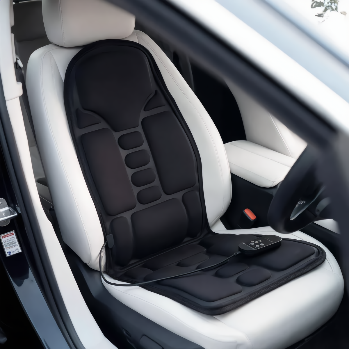 Massage cushion fitted to a car seat