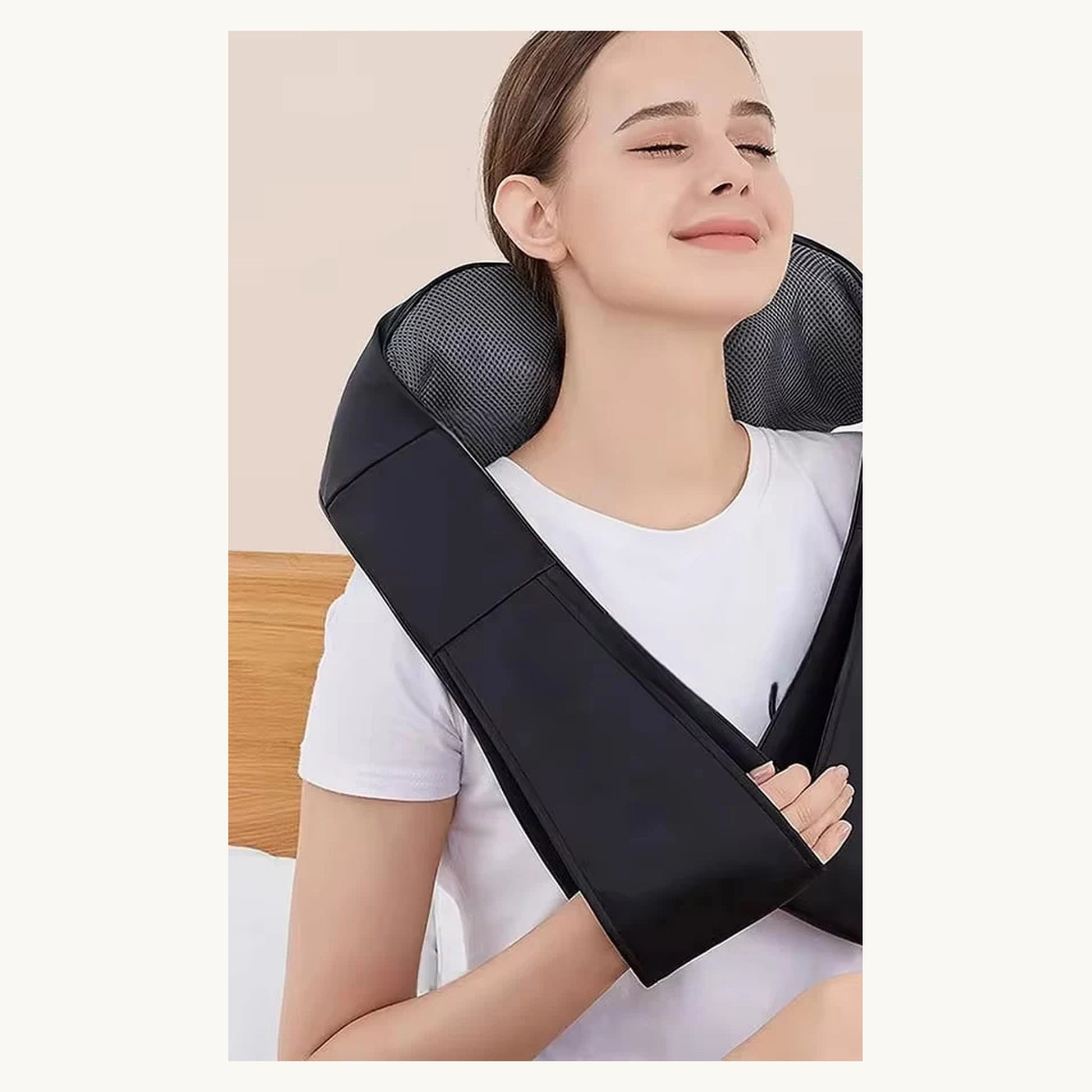 Woman using the ShiatsuEase massager on her neck and shoulders